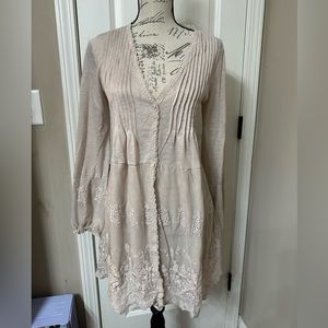 Beautiful lacy lightweight cardigan/top. Boutique purchased. Never worn.